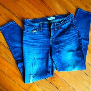 Madewell Skinny Skinny mid rise distressed jeans in medium blue wash